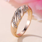 Elegant Zirconia Inlaid Twisted Design Gold Plated Ring