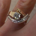 Elegant Two Tone Gold Round Cut Zirconia Swirl Ring