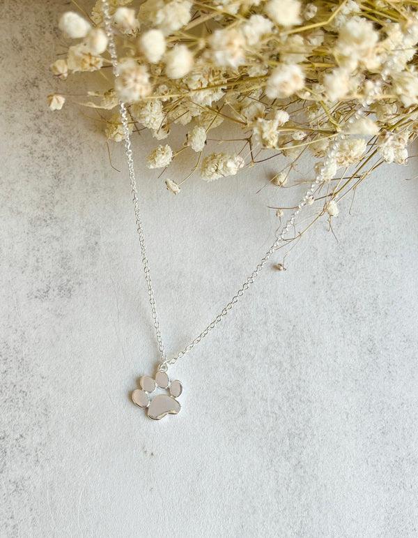 Elegant silver paw-shaped pendant necklace