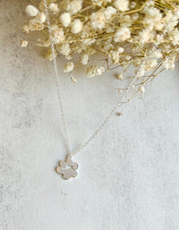 Elegant silver paw-shaped pendant necklace