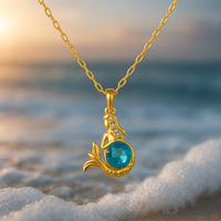Gold Mermaid Necklace with Blue Crystal