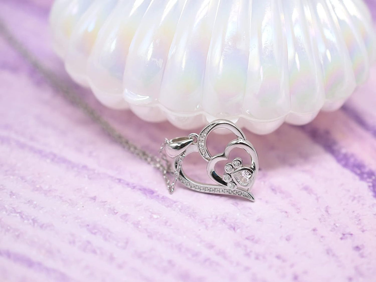 Silver necklace with paw and heart with cubic zirconia