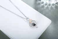 Lucky Paw necklace with heart, bone and infinity symbol