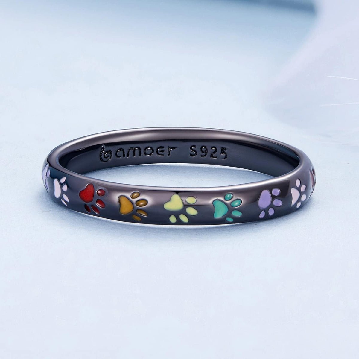 Sterling silver ring with paw-shaped design