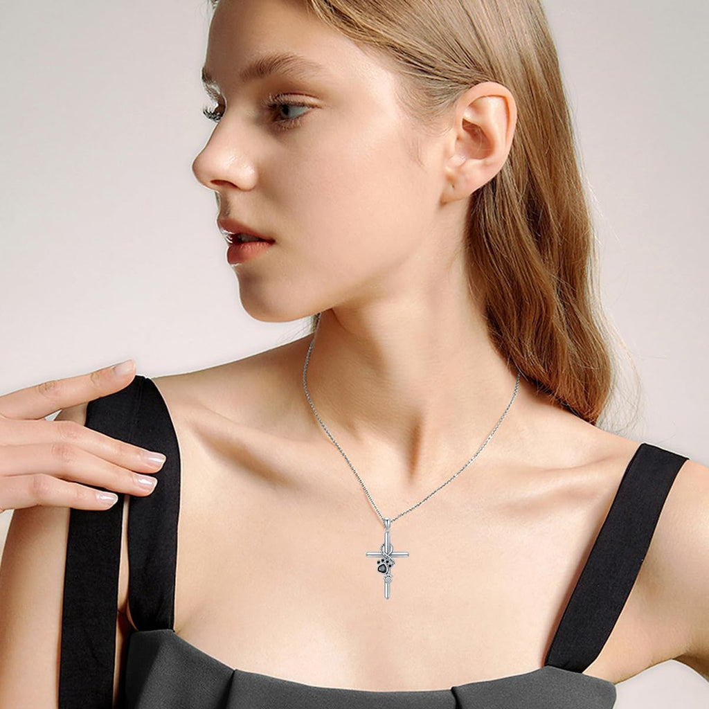 Silver paw and cross pendant necklace