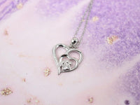 Silver necklace with paw and heart with cubic zirconia