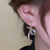 Elegant Baguette Diamond Ribbon Drop Earrings