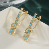 Elegant Gold Tone Synthetic Geometric Turquoise Earrings