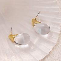 Elegant Clear Teardrop Glass Earrings with Gold Tone Caps