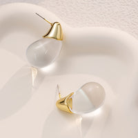 Elegant Clear Teardrop Glass Earrings with Gold Tone Caps