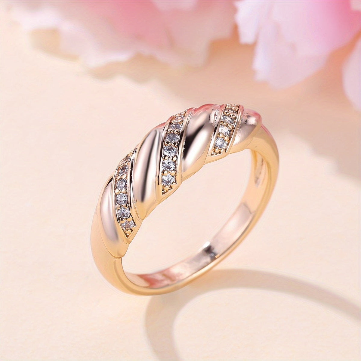 Elegant Zirconia Inlaid Twisted Design Gold Plated Ring