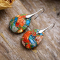Silver ear hooks.
