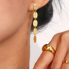 Dewi Hanging Oval Earrings Gold