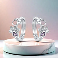 Paw Huggie silver earrings with cubic zirconia and heart-shaped gemstone