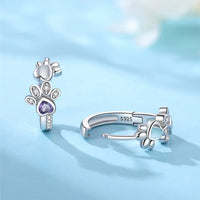 Paw Huggie silver earrings with cubic zirconia and heart-shaped gemstone