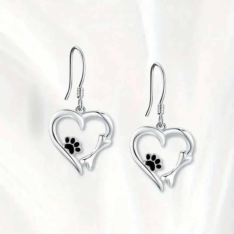 Silver pendant earrings with heart and paw design