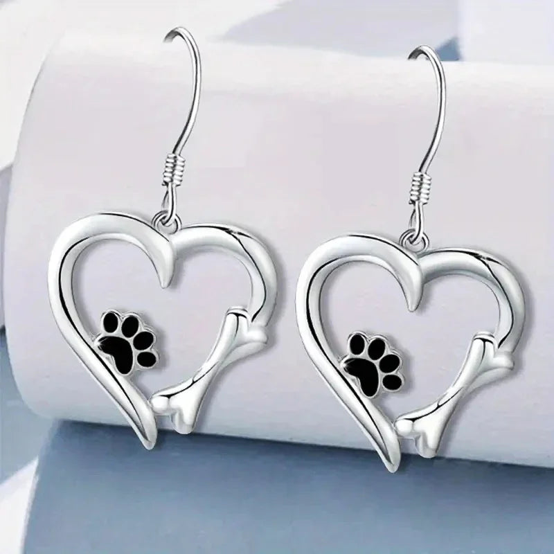 Silver pendant earrings with heart and paw design