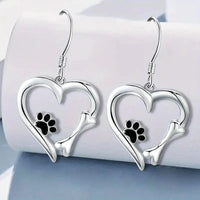 Silver pendant earrings with heart and paw design