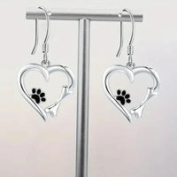 Silver pendant earrings with heart and paw design