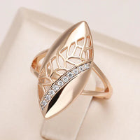 Elegant gold ring with zirconia and hollow tip