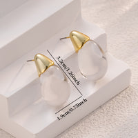 Elegant Clear Teardrop Glass Earrings with Gold Tone Caps
