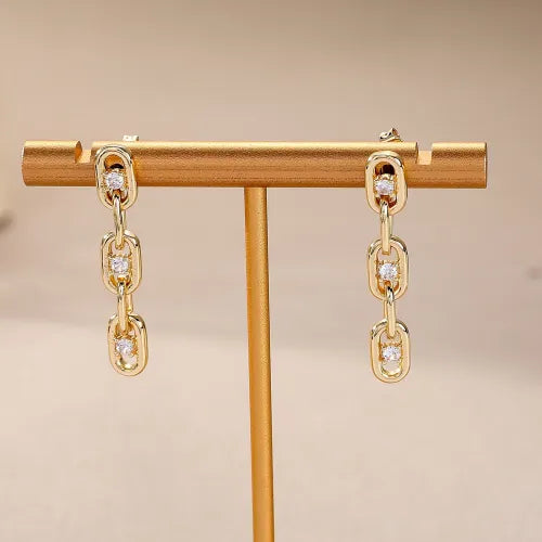 Elegant zirconia chain earrings in gold