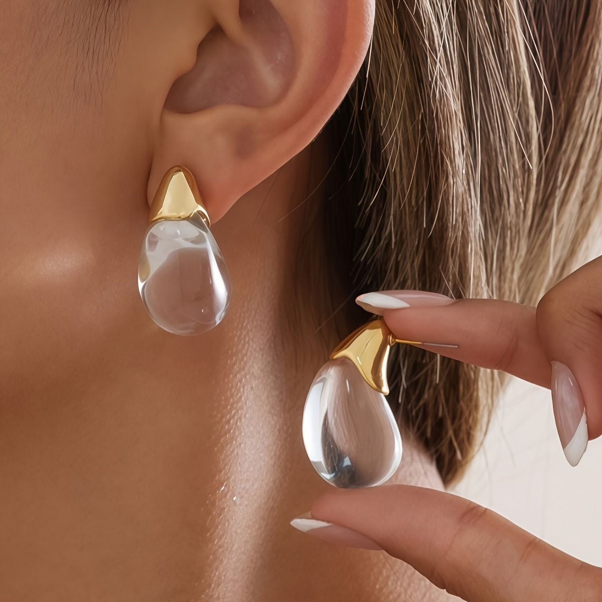 Elegant Clear Teardrop Glass Earrings with Gold Tone Caps