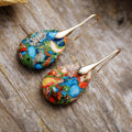 Gold ear hooks.