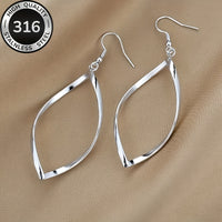 Twisted Sculpted Oval Silver Drop Earrings