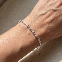 Bracelet bone with pendants in silver