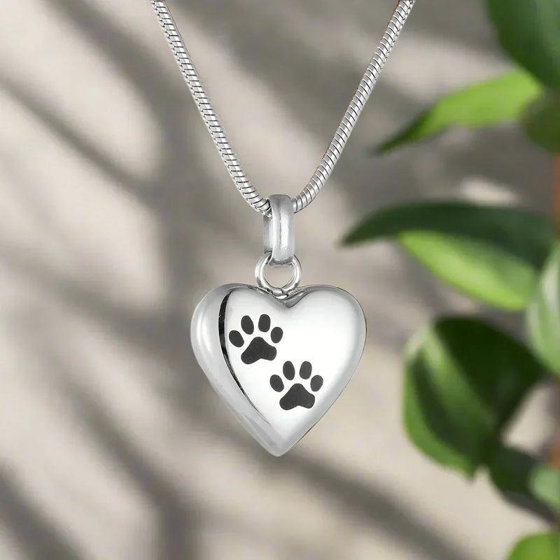 Necklace with pet memorial urn - Heart-shaped pendant with paw engraving