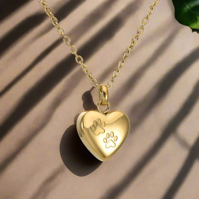 Necklace with pet memorial urn - Heart-shaped pendant with paw engraving