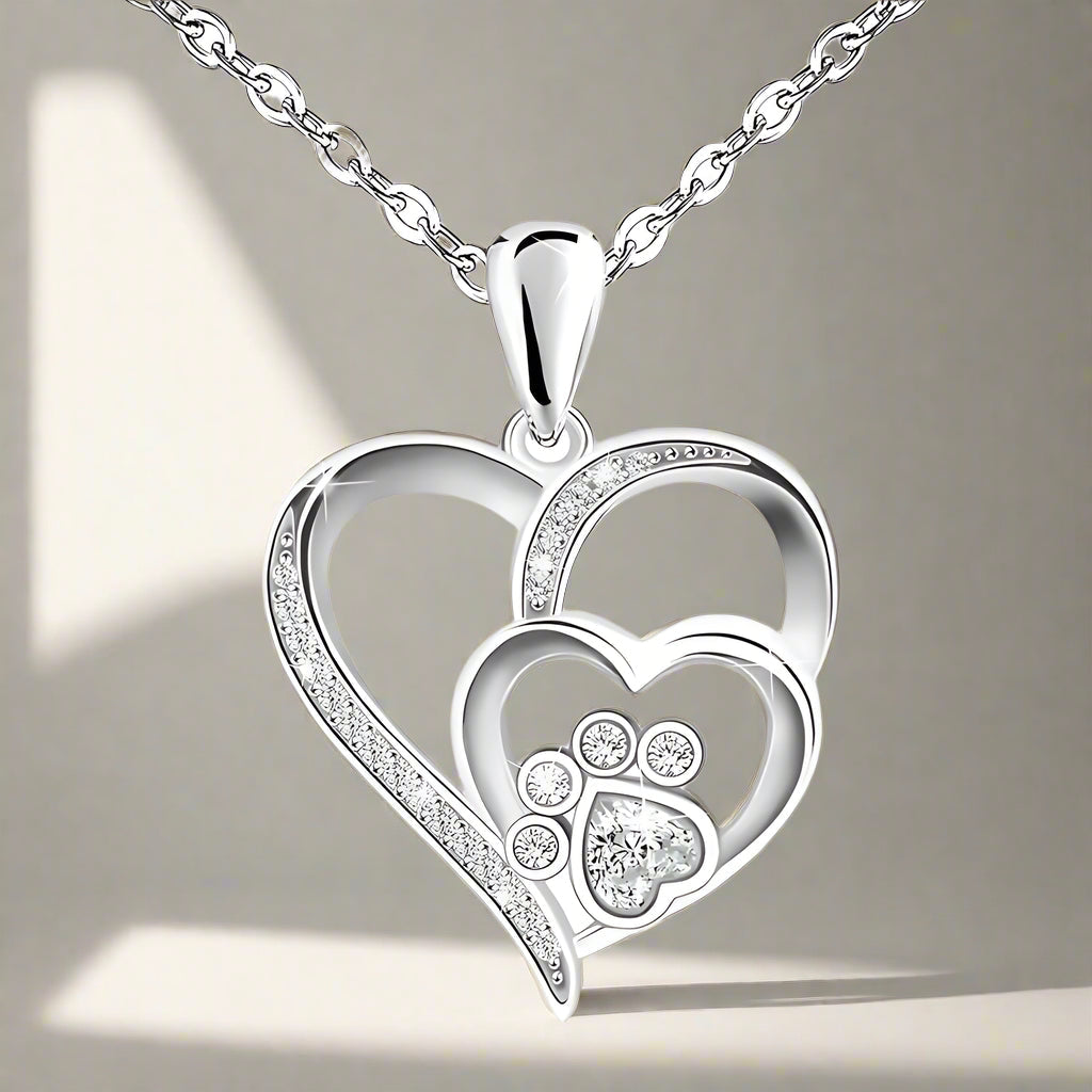 Silver necklace with paw and heart with cubic zirconia