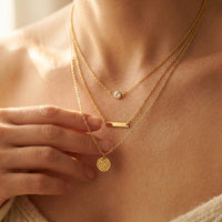 Gold Tone Layered Necklace With Round Pendant
