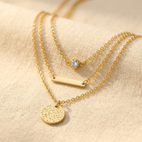 Gold Tone Layered Necklace With Round Pendant