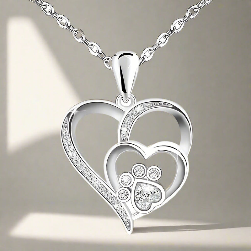 Silver necklace with paw and heart with cubic zirconia